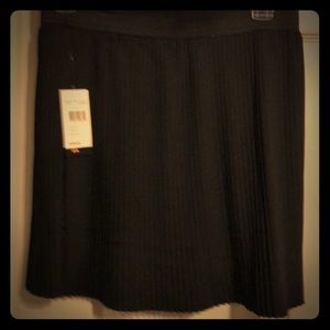 Black pleated mini skirt